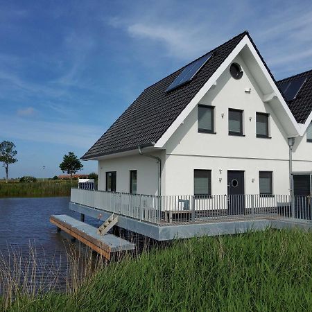 Nr 110 - Ferienhaus Seeperle Pfahlhaus Auf Der Harle カロリーネンジール エクステリア 写真